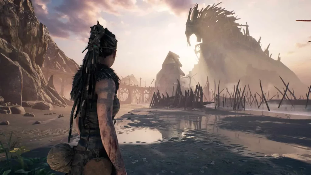 Senua observa una estructura ritual en Hellblade: Senua’s Sacrifice, donde el trauma interior se proyecta como un viaje mitológico externo.